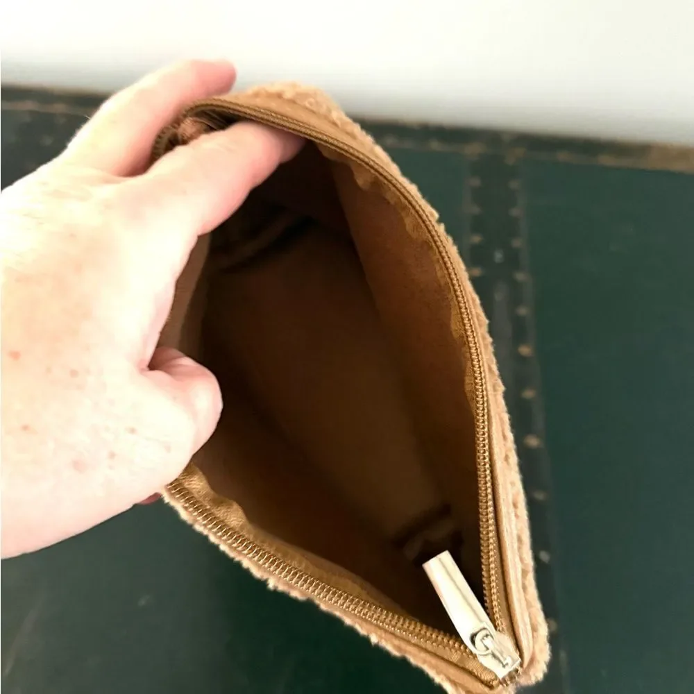 Neiman Marcus tan sherpa cosmetic bag